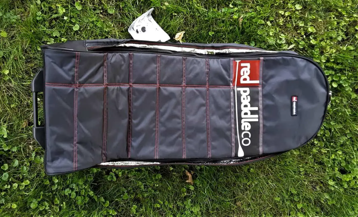 Traveling by foot with an Inflatable Paddle Board  red paddle co travel bag